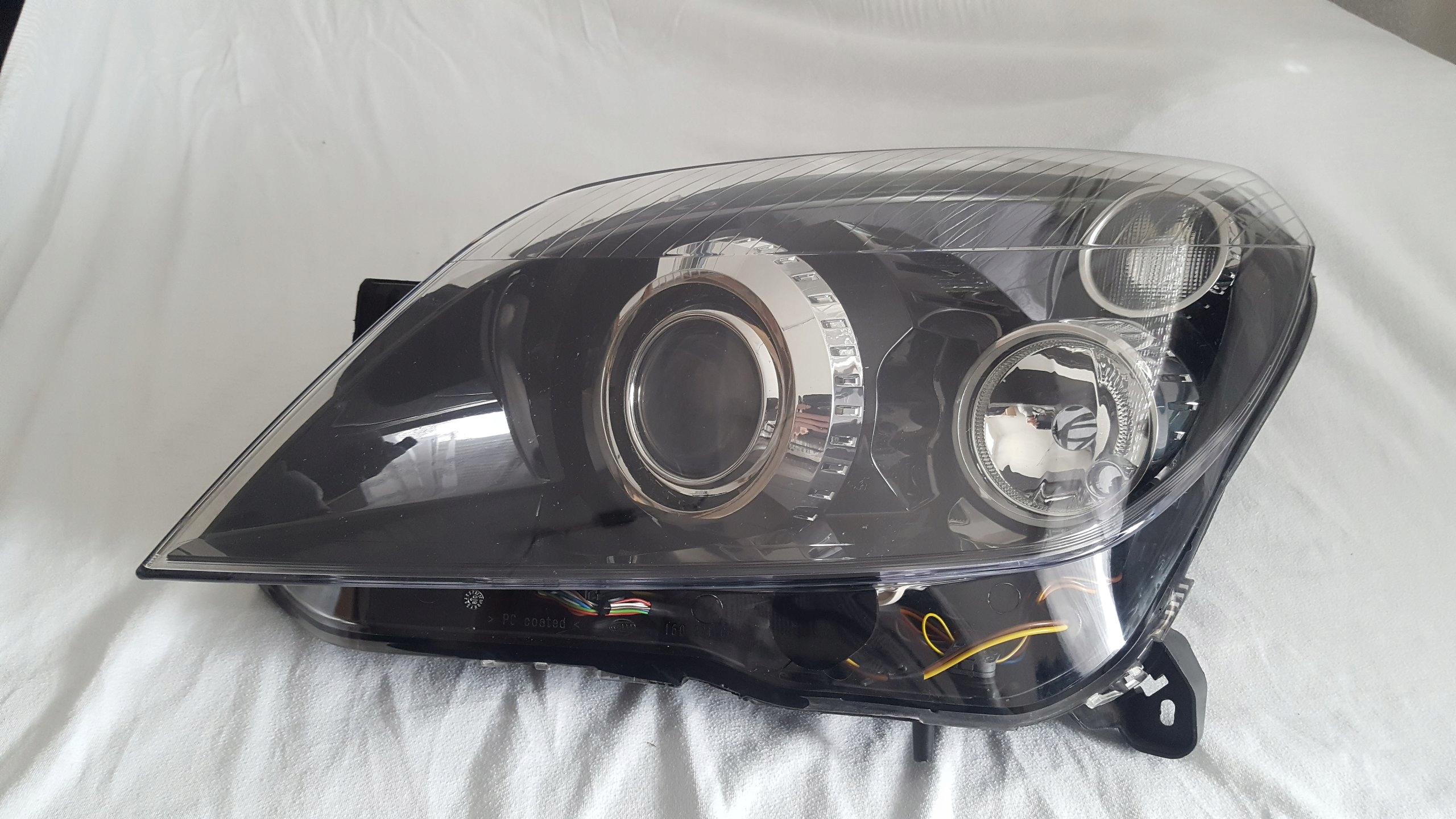 OPEL ASTRA H BIXENON SKRETNY LEWA LAMPA ORYGINALNA 7430234913