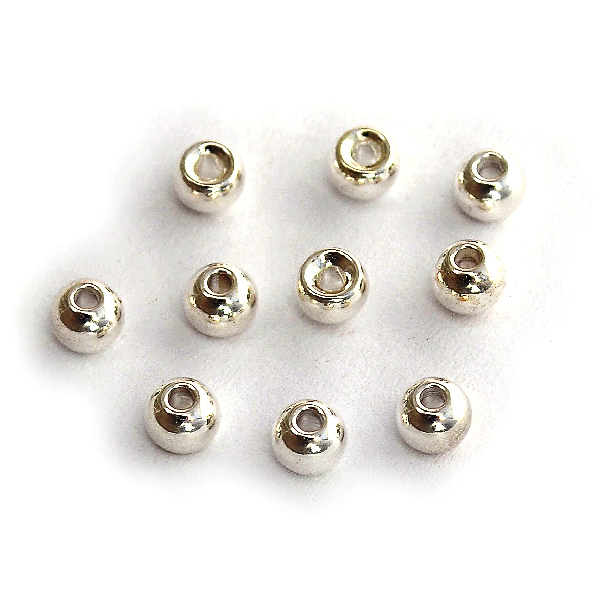 

Koraliki mosiężne 3,8 mm okrągły otwór srebrne