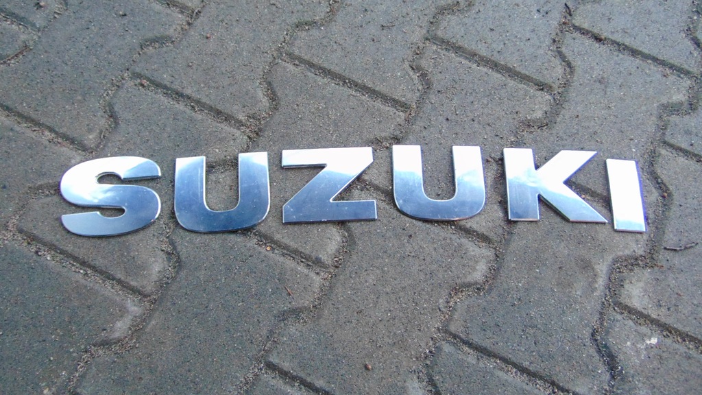 Emblemat Suzuki Grand Vitara II na koło zapasowe 