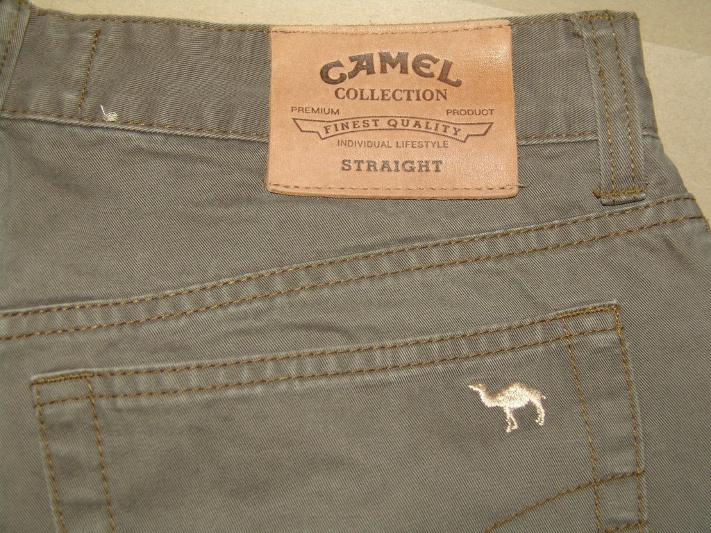 Tanio,oryginalne spodnie CAMEL COLLECTION 34/36