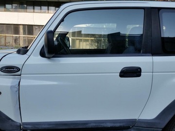 Левая дверь ssang yong korando запчасти-, фото