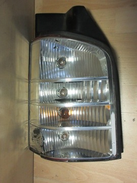 VW T5 Lampa tył lewa 7H5945095 wkład